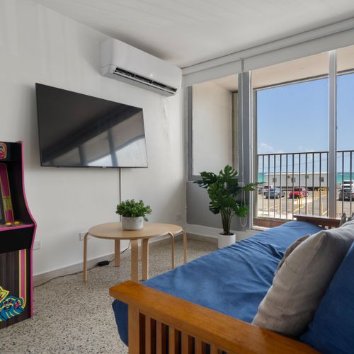 Gather and connect in this cozy living space, perfect for movie nights or quiet relaxation.