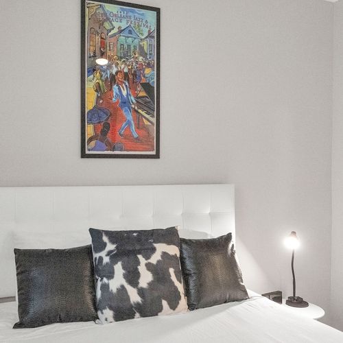 Vibrant NOLA-inspired bedroom art that brings the soul of the city indoors.