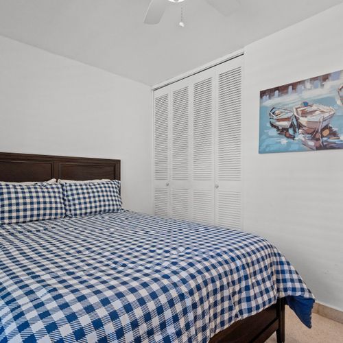 Relaxing Retreat: This beautifully decorated bedroom offers a comfortable bed and a serene ambiance, perfect for a peaceful night's sleep.