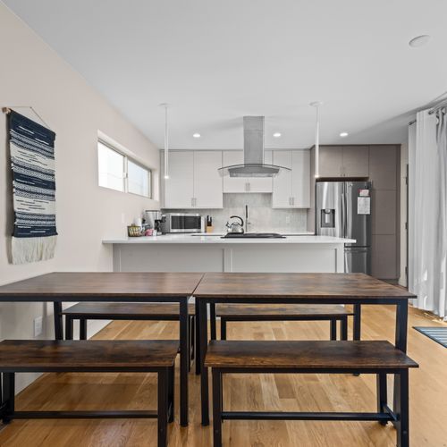 A bright, practical kitchen with abundant natural light.