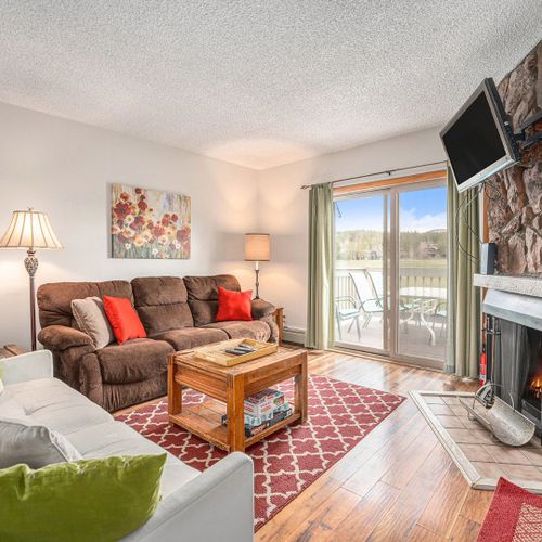Sink into the plush sectional sofa after a day of mountain adventures.