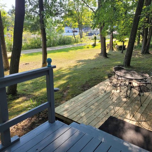 Exterior:  the deck, yard, and turk lake