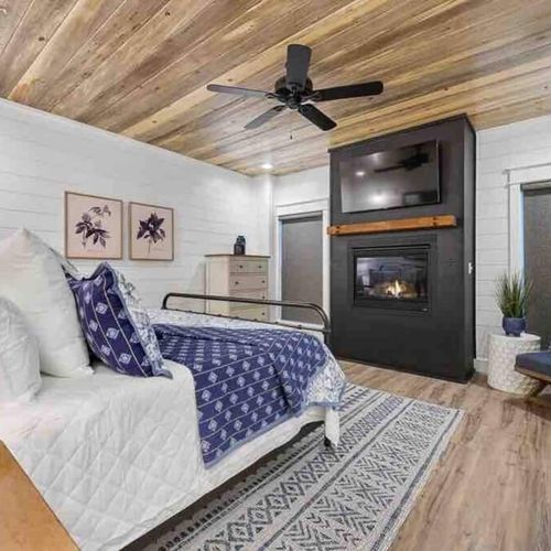 This suite has a luxurious gas fireplace and king bed!