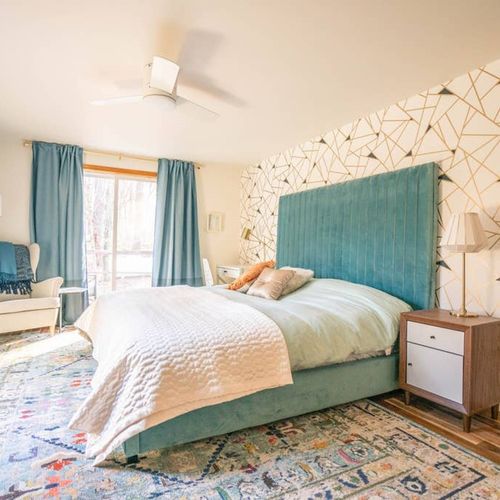 Beautiful primary bedroom with king bed and en suite bathroom.