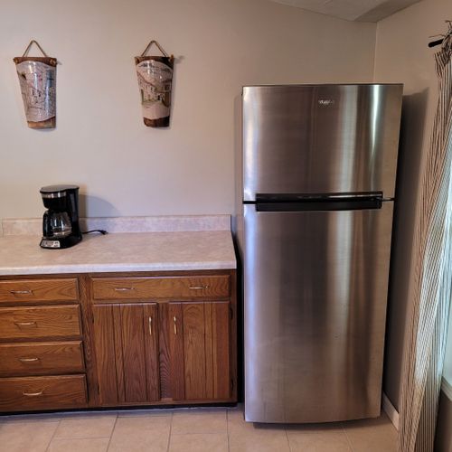 Kitchen:  the home has a fairly large kitchen with all appliances including a dishwasher. Also has a good supply of cooking and dining utensils.