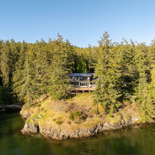 Grindstone Harbor with home  overlooking the water.