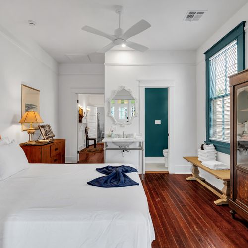 Spacious bedroom w/ an ensuite bath just steps away.