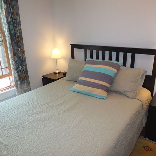 Bedroom #2 (second floor):  this bedroom features a queen-size bed, large closet, nightstands, lamps, and a baby crib! It is on the second floor.