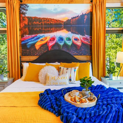 Colorful kayak décor adds a splash of excitement to this warm, welcoming space.