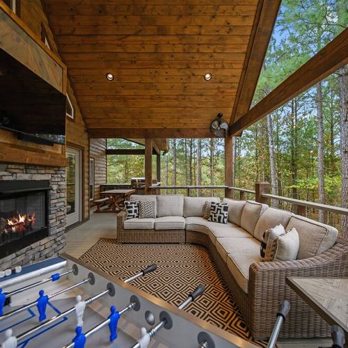 The covered outdoor patio with games and lounging.