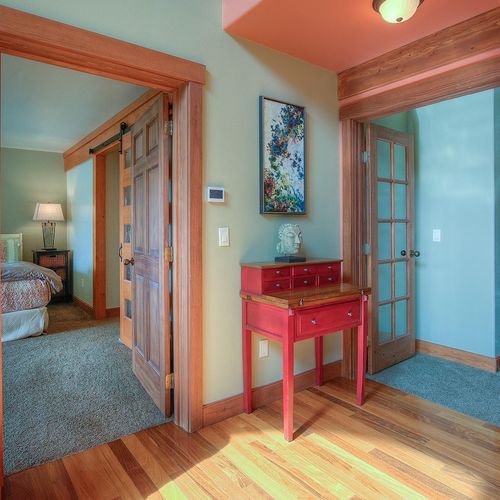 Master bedroom is located on the main floor with the theater room off to the side.