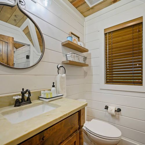 A shared full bathroom on the second level.