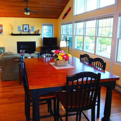 Dining area:  there is a lovely dining area with a table and chairs for up to 6 adults. It is located between the kitchen and the living room.