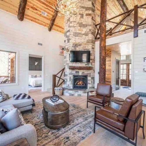 The center of the room is the gas fireplace and tv!