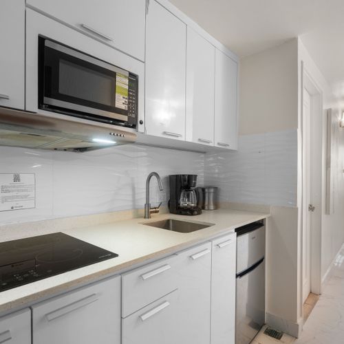 "Whip up your favorite breakfast or a quick lunch in this bright and functional kitchenette