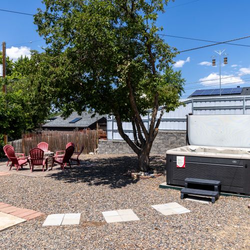 Find shade, sun, or stars—this home’s outdoor hangouts have it all.
