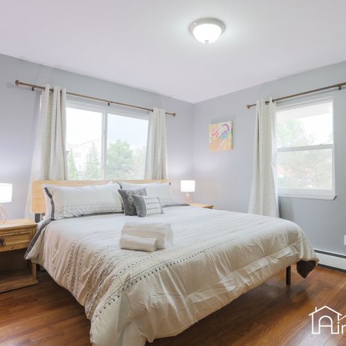 Each bedroom offers ample natural light and welcoming interiors.