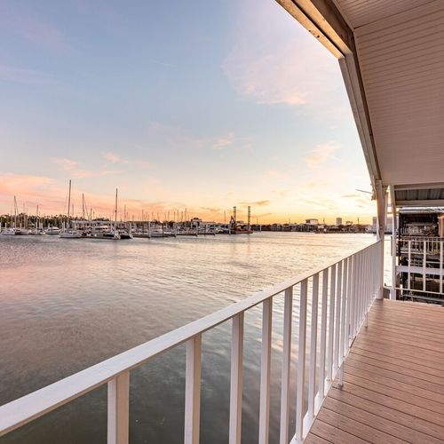 Rear-facing balcony off of master bedroom with view of Southern Yacht Club and the Lake Pontchartrain Marina.
