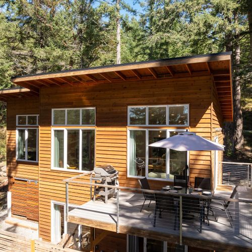 The floorplan of this home flows from inside to out, making dining outdoors a pleasure.