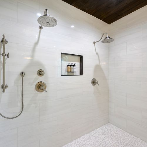 The walk-in shower with double heads!