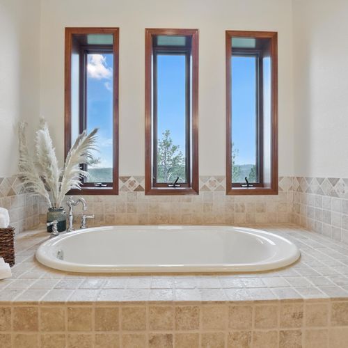 Sleek bathroom with space to breathe and unwind.