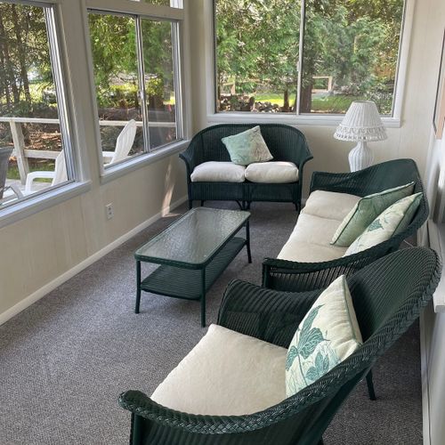 Porch:  the cottage has a beautiful enclosed porch with comfy seating and great views of the lake!