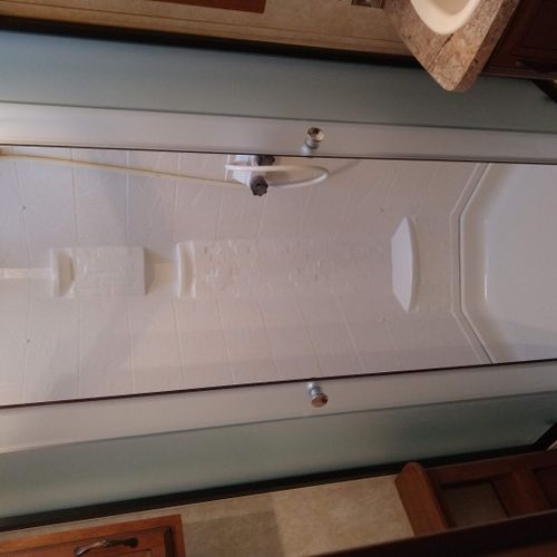 Bathroom #2:  full bathroom with a shower, sink, vanity, and toilet.
