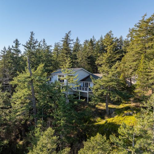 Our home is surrounded by beautiful greenery for much added privacy and serene stay