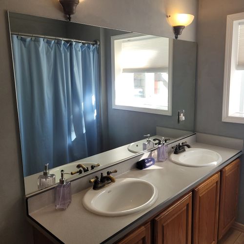 BATHROOM #1 (MAIN FLOOR):  This is a full private ensuite bathroom for Bedroom #1.  It includes a combination tub and shower.