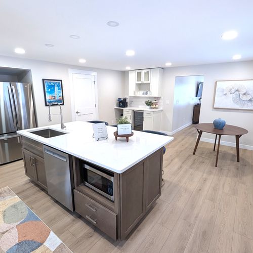 KITCHEN:  The home has a big and beautiful kitchen with all appliances including a dish washer, coffee bar, food pantry, and separate beverage cooler