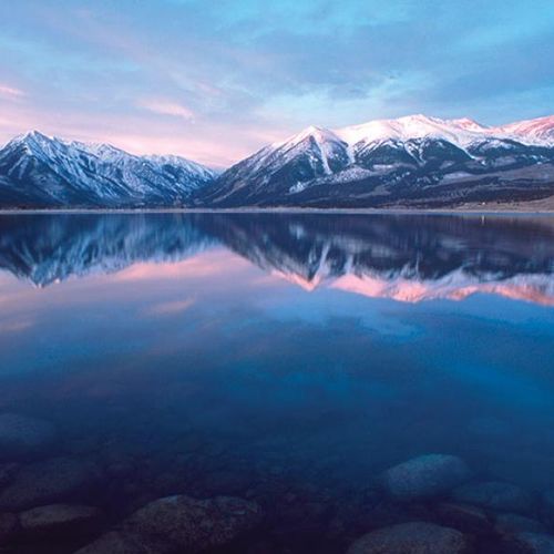 Find your peace amidst the tranquil lakes and towering mountains