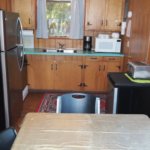 Kitchen:  the cottage has a cute little kitchen with all appliances except for a dishwasher. Includes a good supply of cooking and dining utensils.