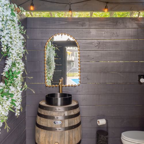 This lovely little powder room is available on the pool deck for easy access between dips!