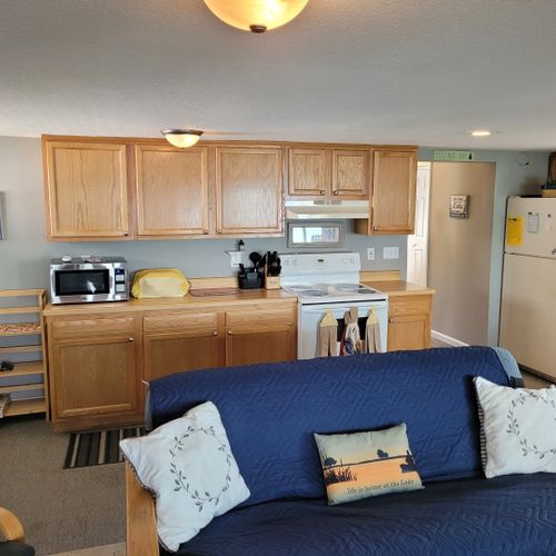 Kitchen:  full kitchen with a good supply of cooking and dining utensils. All appliances except for a dishwasher.
