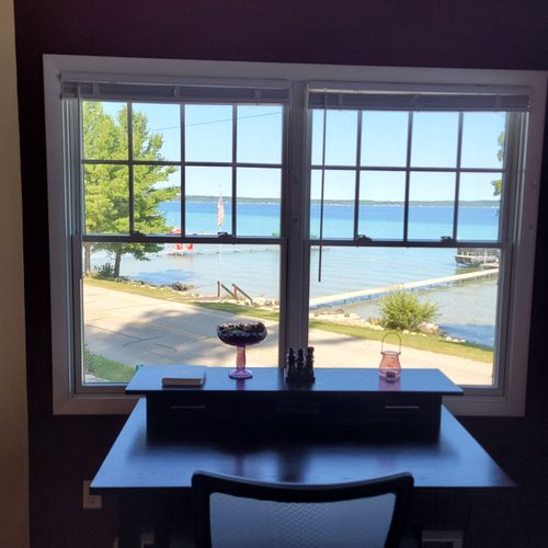 LIVING ROOM #2 ((SECOND FLOOR):  There is a desk and chair in this living room that has a great view of Crystal Lake!