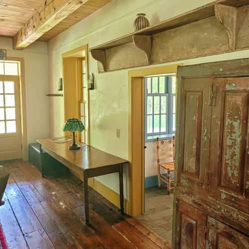 Rustic wood floors and details throughout the farmhouse
