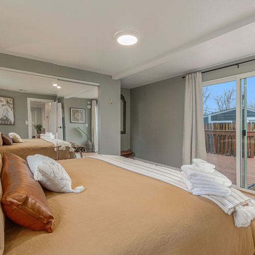 - slide open the doors and let the fresh air flow into your spacious, mirror lit haven
- dive into a comfortable bed layered with textures that practically whisper stay in
- this room’s calming vibes and woodsy charm make it hard to leave