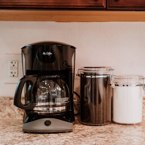 - jumpstart your mornings with fresh brews from the easy to use coffee maker
- conveniently stocked with ground coffee and sugar for hassle free sipping
- cozy corner setup that brings your morning ritual to life in seconds