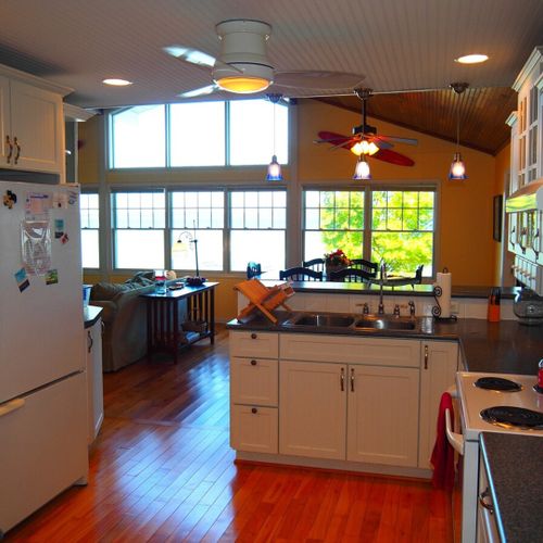 Kitchen:  the home has a large, beautiful, and very functional kitchen with all appliances including a dishwasher. There is a good supply of cooking and dining utensils included as well.