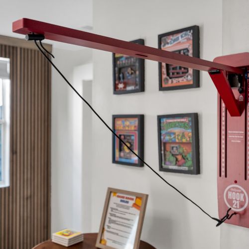 Framed retro gaming art decorating the walls — nostalgia at every turn.