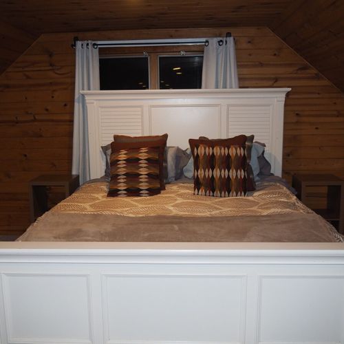 Bedroom #2 (second floor):  this is a huge upstairs bedroom with it's own television, desk, jetted tub, king-size bed, dresser, mirror, closet, and private en suite bathroom!