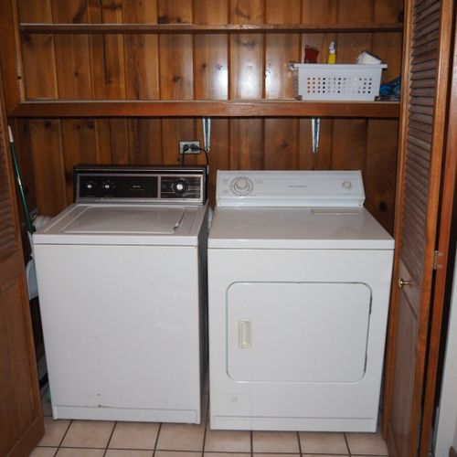 Bathroom #1:  full bathroom with a combination tub and shower. The washer and dryer are also in this bathroom.