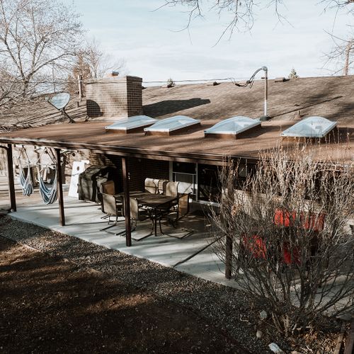 There is a covered patio, barbecue and plenty of seating in the fenced in backyard. Plenty of dog amenities: leashes, food and water bowls, poop bags, towels for dogs.