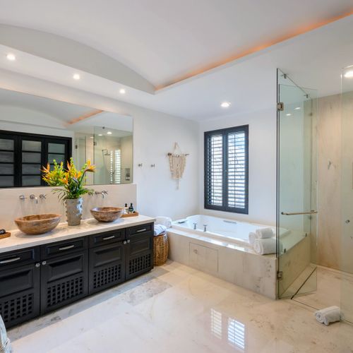 Double Vanity, Jetted Tub, Spacious Marble Shower, and Spa-Grade Toiletries