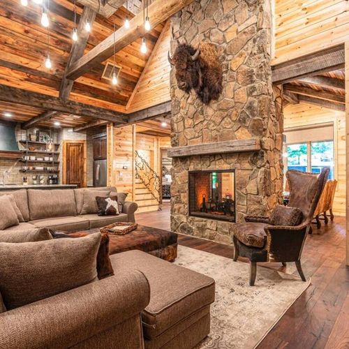 The fireplace separates the lodge room from the formal dining room.