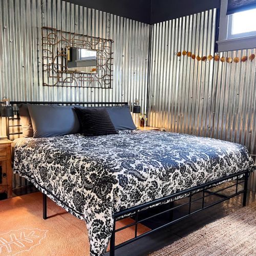 Sink into this king bed dressed in bold floral linens after a long day out.
