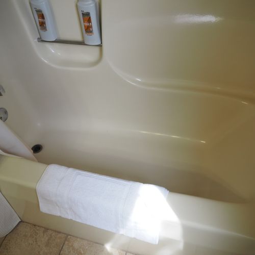 Guest bathroom:  this is a full bathroom that has a common entrance. It includes a combination tub and shower.