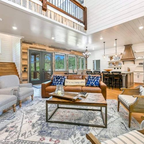 Another view of all of the seating offered in the living room.