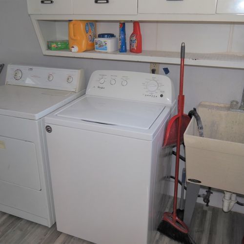Laundry room:  convenient laundry room with washer, dryer, and sink just off of the kitchen.