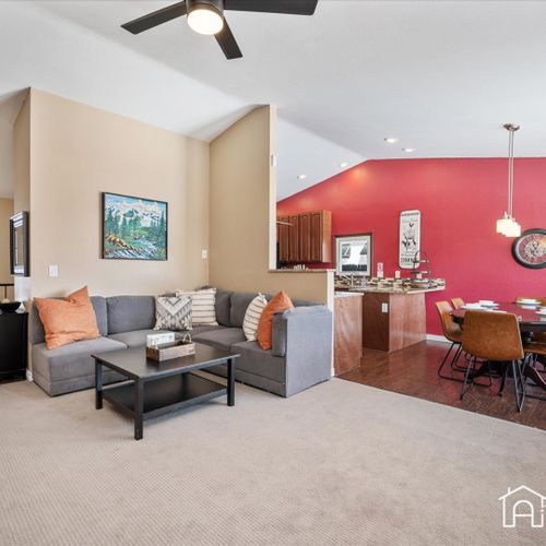 Gather your loved ones in the inviting living room, perfect for watching movies, spending quality time.